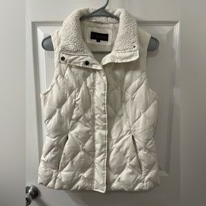 Cream-colored puffer vest